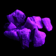 Pink Aragonite 9 small stones 23-35mm 77g in UV light - Rocks and Things Store