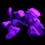 Pink Aragonite 9 small stones 23-35mm 77g in UV light - Rocks and Things Store