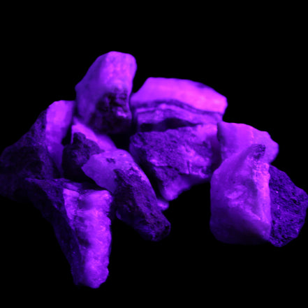 Pink Aragonite 9 small stones 23-35mm 77g in UV light - Rocks and Things Store