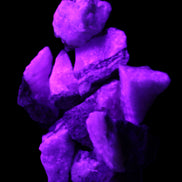 Pink Aragonite 9 small stones 23-35mm 77g in UV light - Rocks and Things Store