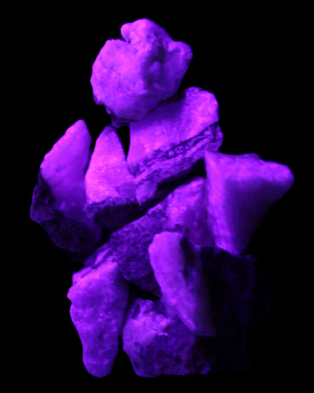 Pink Aragonite 9 small stones 23-35mm 77g in UV light - Rocks and Things Store