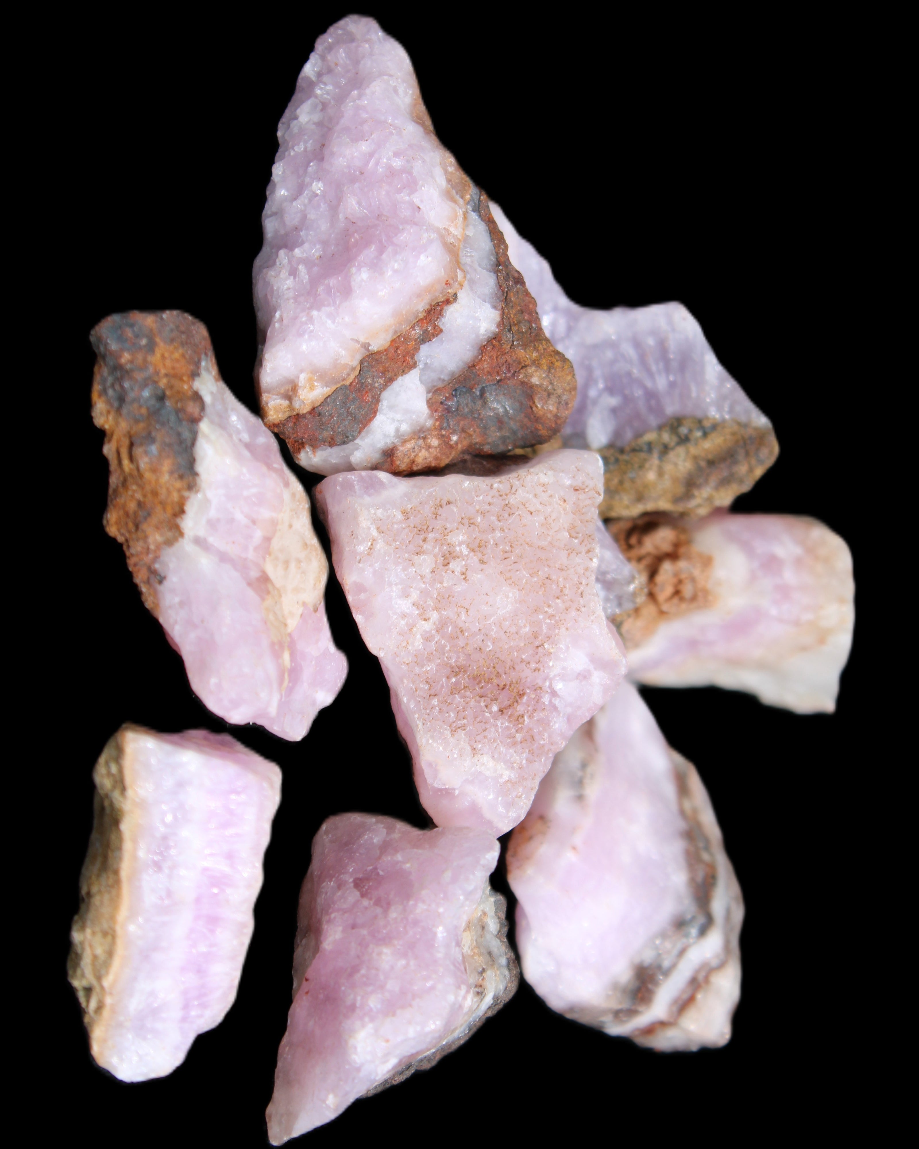 Pink Aragonite 9 small stones 23-35mm 77g in UV light - Rocks and Things Store