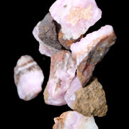 Pink Aragonite 9 small stones 23-35mm 77g in UV light - Rocks and Things Store