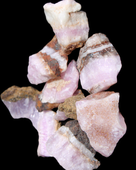 Pink Aragonite 9 small stones 23-35mm 77g in UV light - Rocks and Things Store