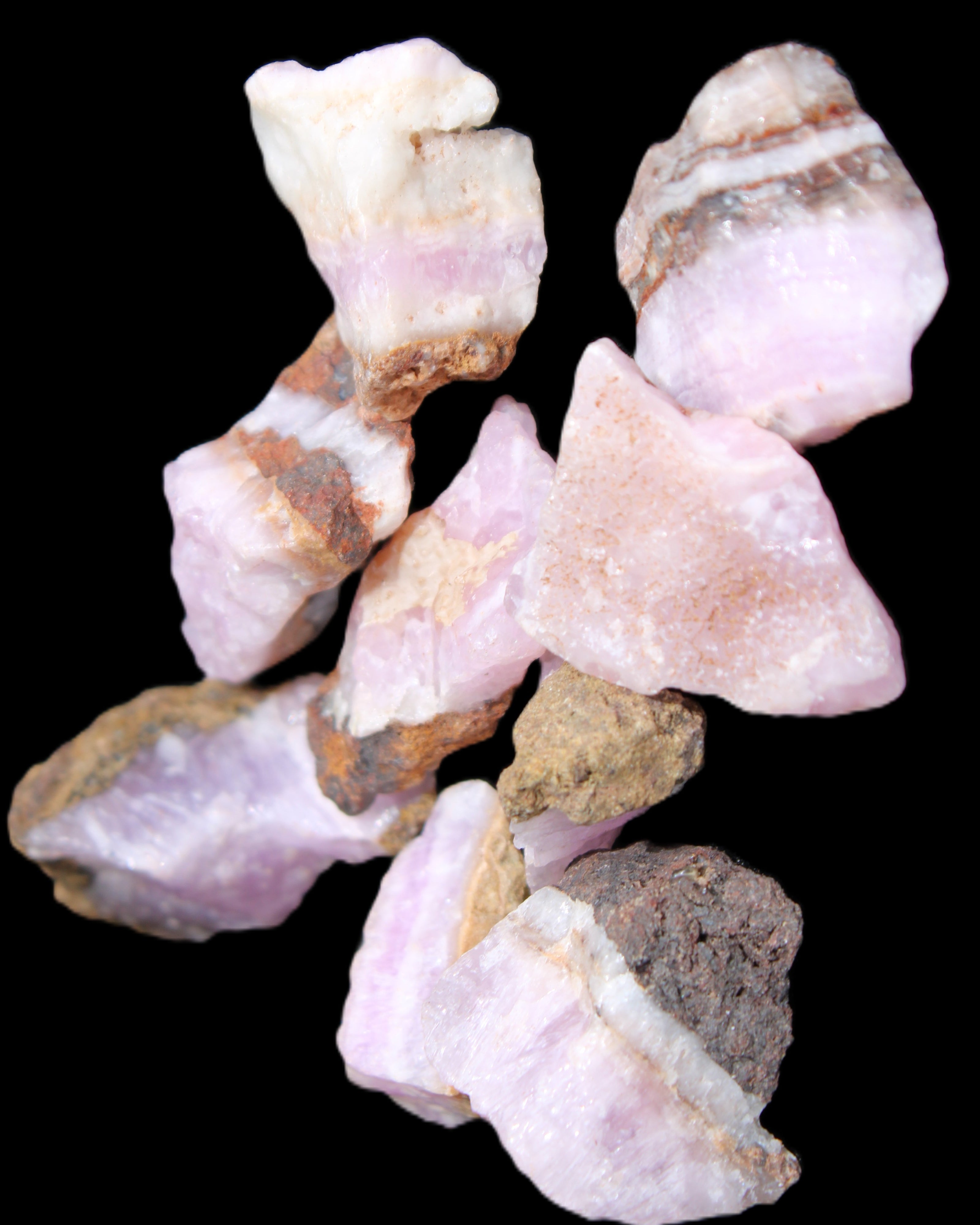 Pink Aragonite 9 small stones 23-35mm 77g in UV light - Rocks and Things Store