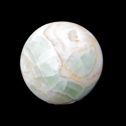 Orange, Lime and Lemon Aragonite sphere 648g in sunlight - Rocks and Things Store