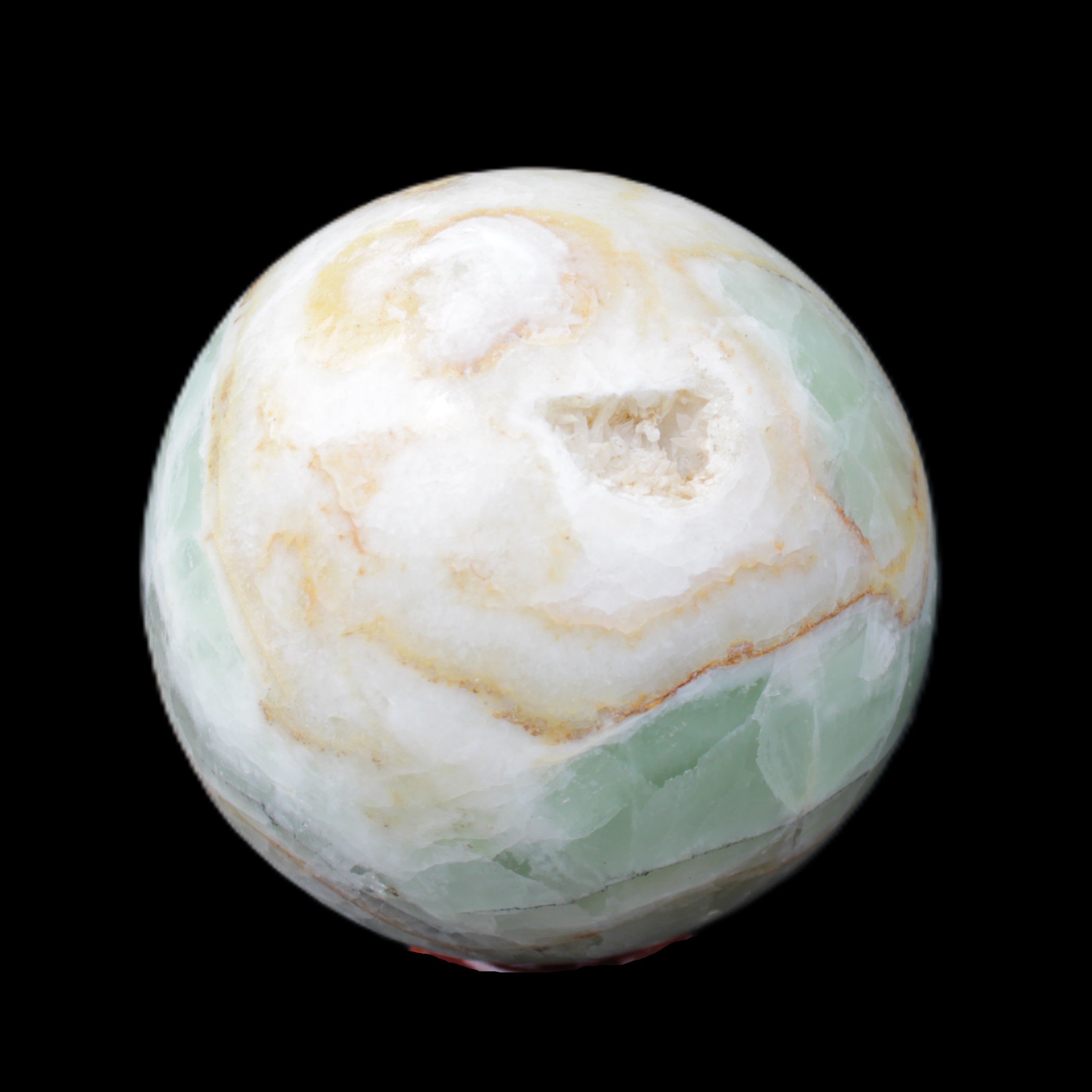 Orange, Lime and Lemon Aragonite sphere 648g in sunlight - Rocks and Things Store