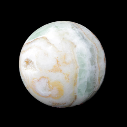 Orange, Lime and Lemon Aragonite sphere 648g in sunlight - Rocks and Things Store