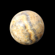 Bumblebee Calcite sphere 80g in sunlight - Rocks and Things Store