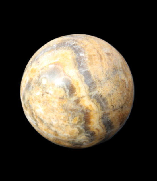 Bumblebee Calcite sphere 80g in sunlight - Rocks and Things Store