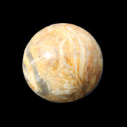 Bumblebee Calcite sphere 80g in sunlight - Rocks and Things Store