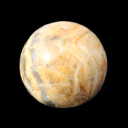 Bumblebee Calcite sphere 80g in sunlight - Rocks and Things Store