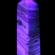 Aqua Blue Caribbean Calcite obelisk 292g in UV light - Rocks and Things Store