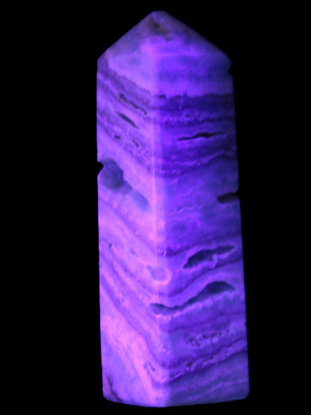 Aqua Blue Caribbean Calcite obelisk 292g in UV light - Rocks and Things Store