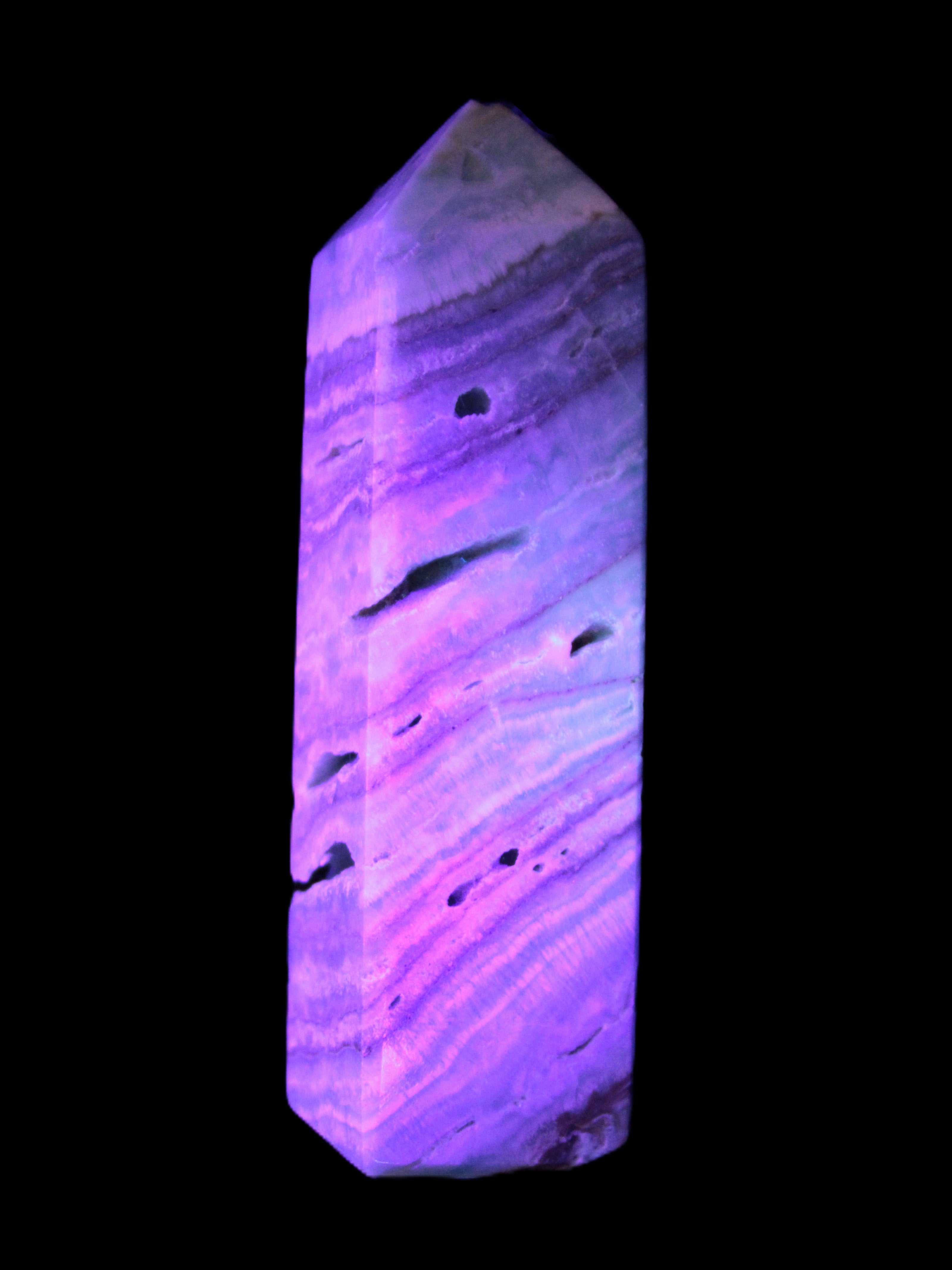 Aqua Blue Caribbean Calcite obelisk 292g in UV light - Rocks and Things Store