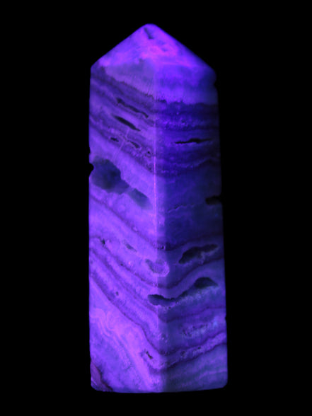 Aqua Blue Caribbean Calcite obelisk 292g in UV light - Rocks and Things Store