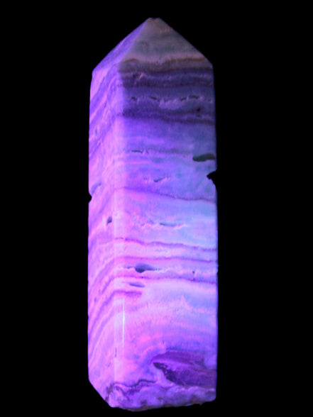 Aqua Blue Caribbean Calcite obelisk 292g in UV light - Rocks and Things Store