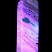 Aqua Blue Caribbean Calcite obelisk 292g in UV light - Rocks and Things Store