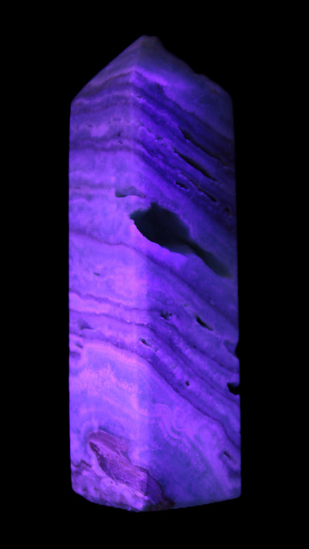 Aqua Blue Caribbean Calcite obelisk 292g in UV light - Rocks and Things Store