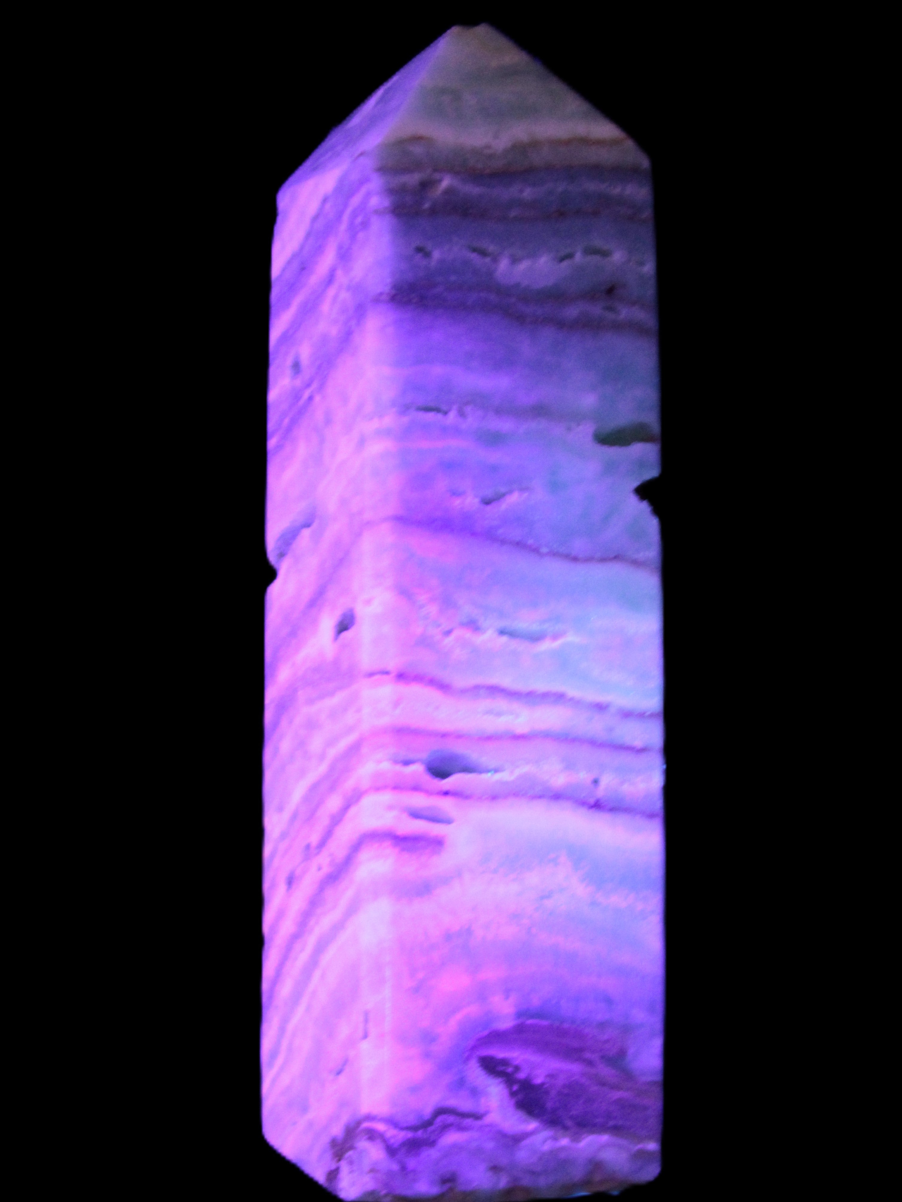 Aqua Blue Caribbean Calcite obelisk 292g in UV light - Rocks and Things Store