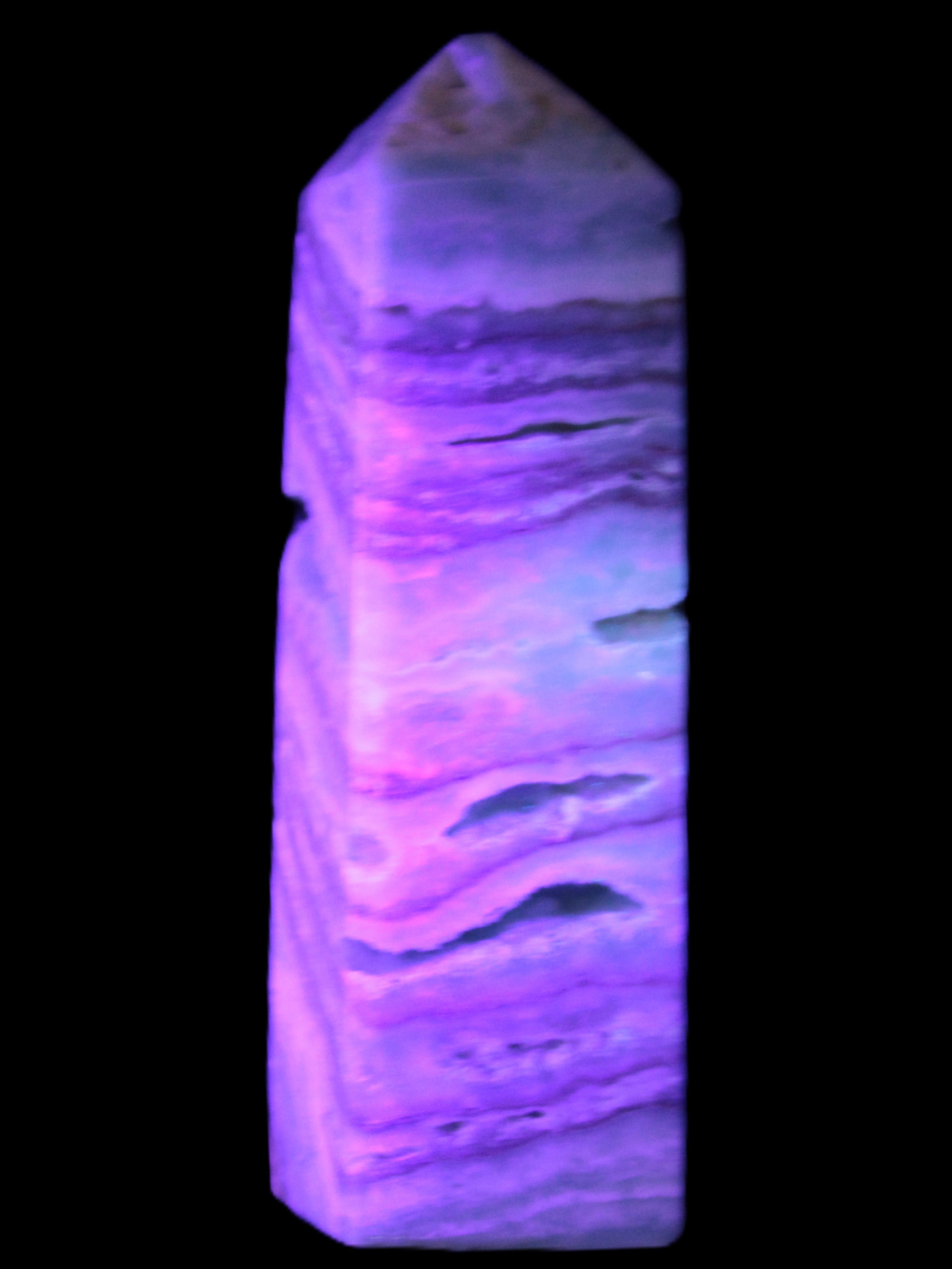 Aqua Blue Caribbean Calcite obelisk 292g in UV light - Rocks and Things Store