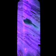 Aqua Blue Caribbean Calcite obelisk 292g in UV light - Rocks and Things Store