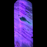 Aqua Blue Caribbean Calcite obelisk 292g in UV light - Rocks and Things Store