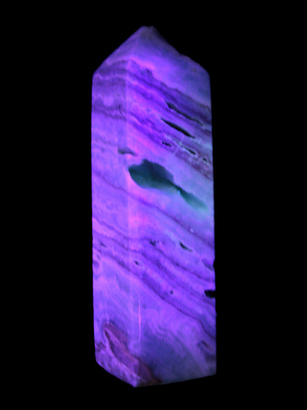 Aqua Blue Caribbean Calcite obelisk 292g in UV light - Rocks and Things Store