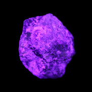 Green Garnet from Pakistan 25*21mm crystal 21g in UV light - Rocks and Things Store