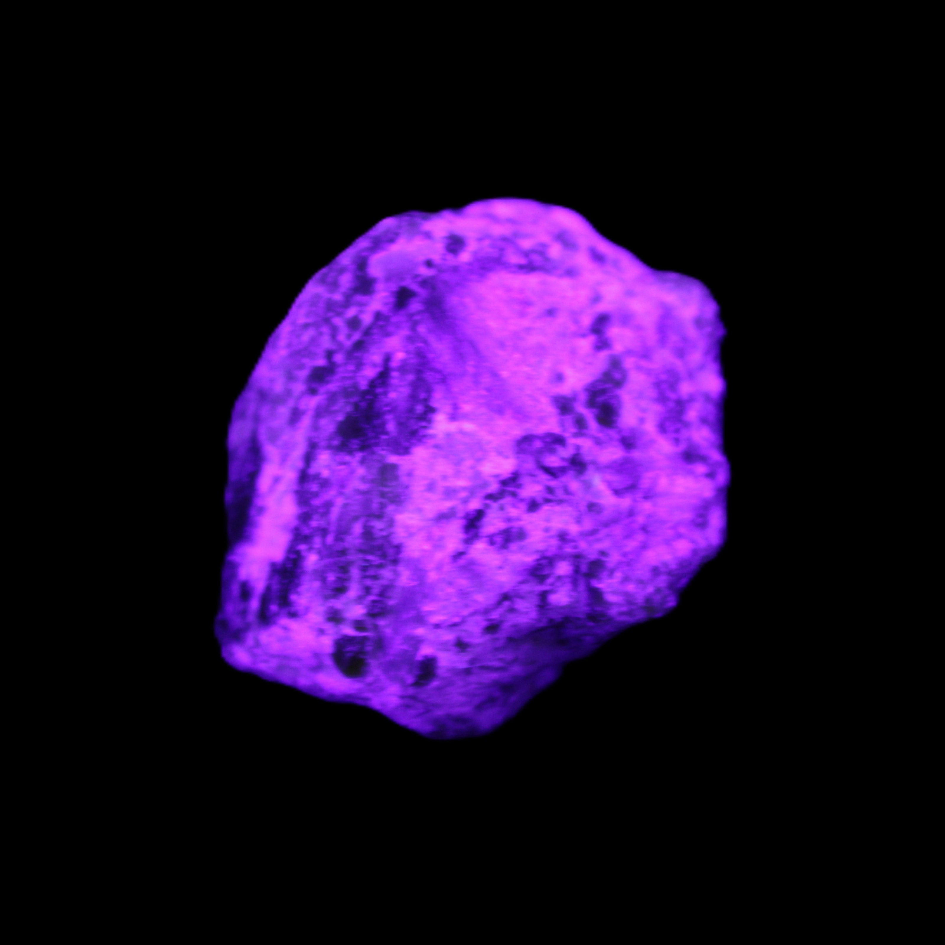 Green Garnet from Pakistan 25*21mm crystal 21g in UV light - Rocks and Things Store
