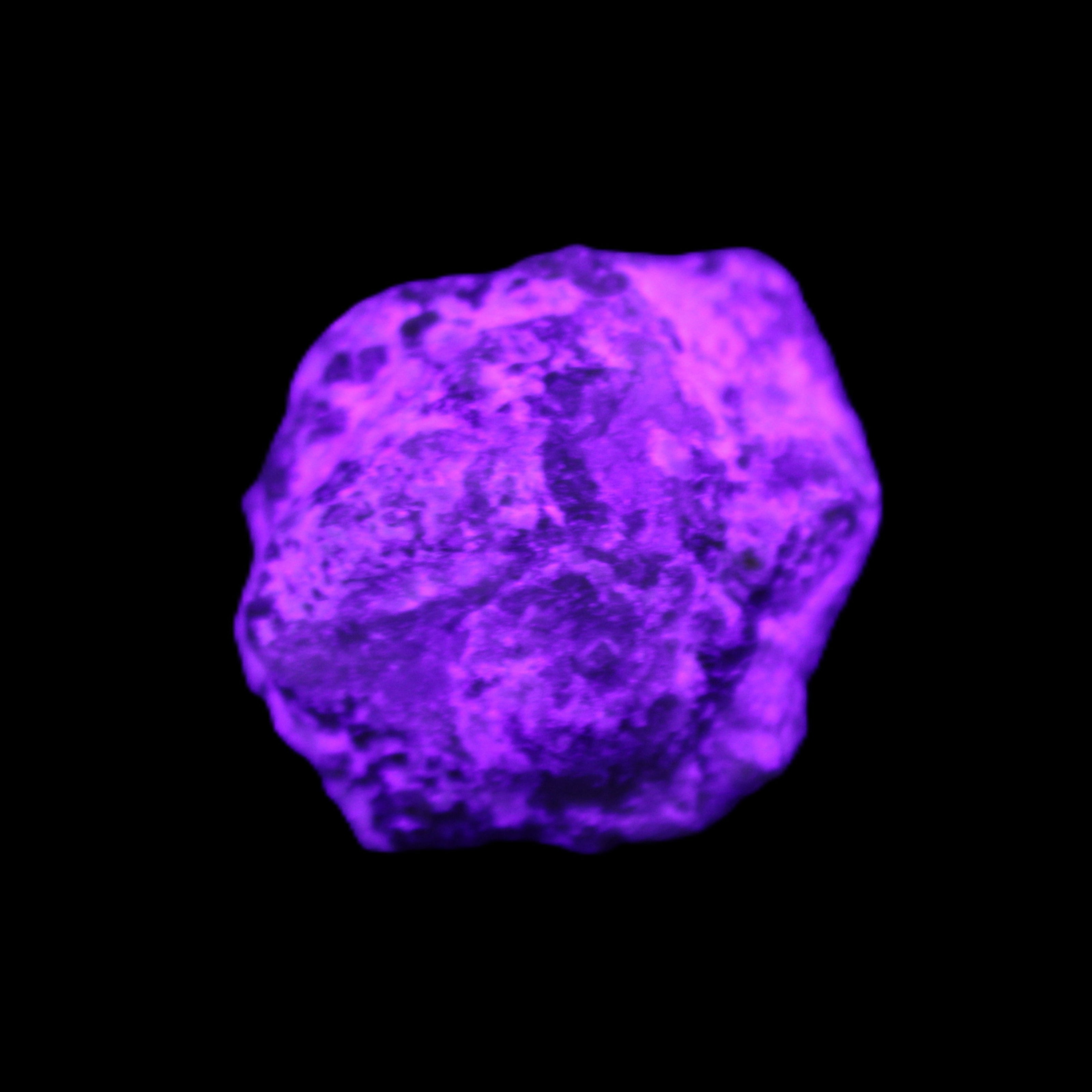 Green Garnet from Pakistan 25*21mm crystal 21g in UV light - Rocks and Things Store