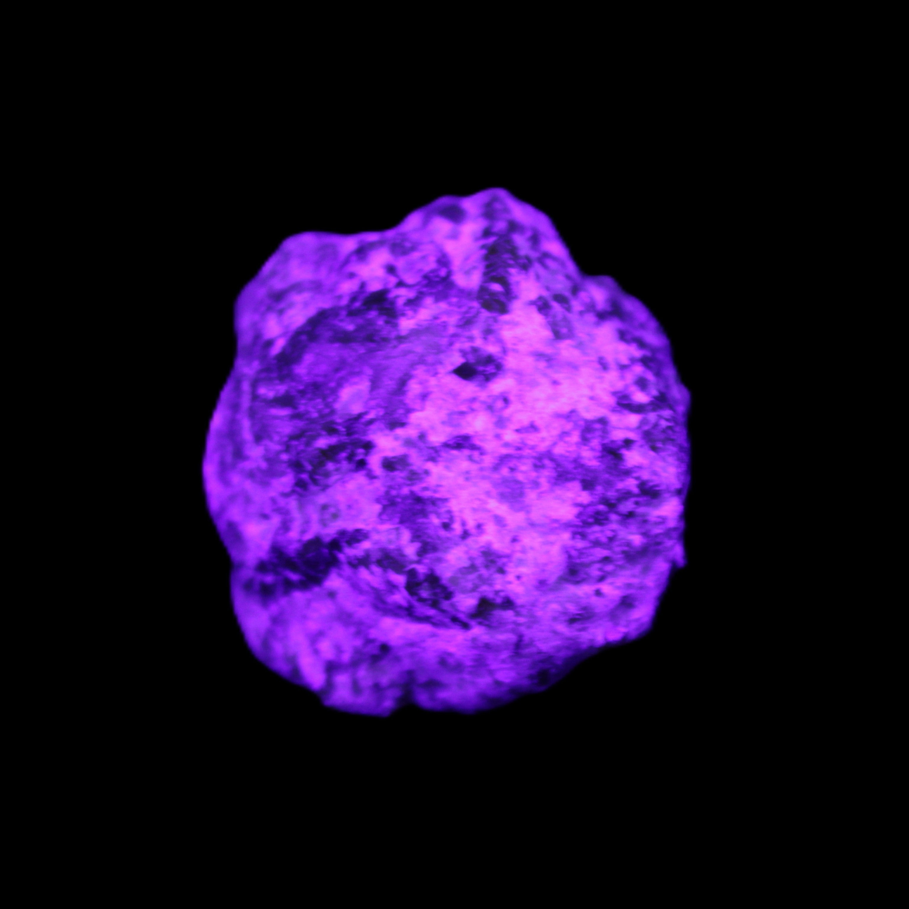 Green Garnet from Pakistan 25*21mm crystal 21g in UV light - Rocks and Things Store