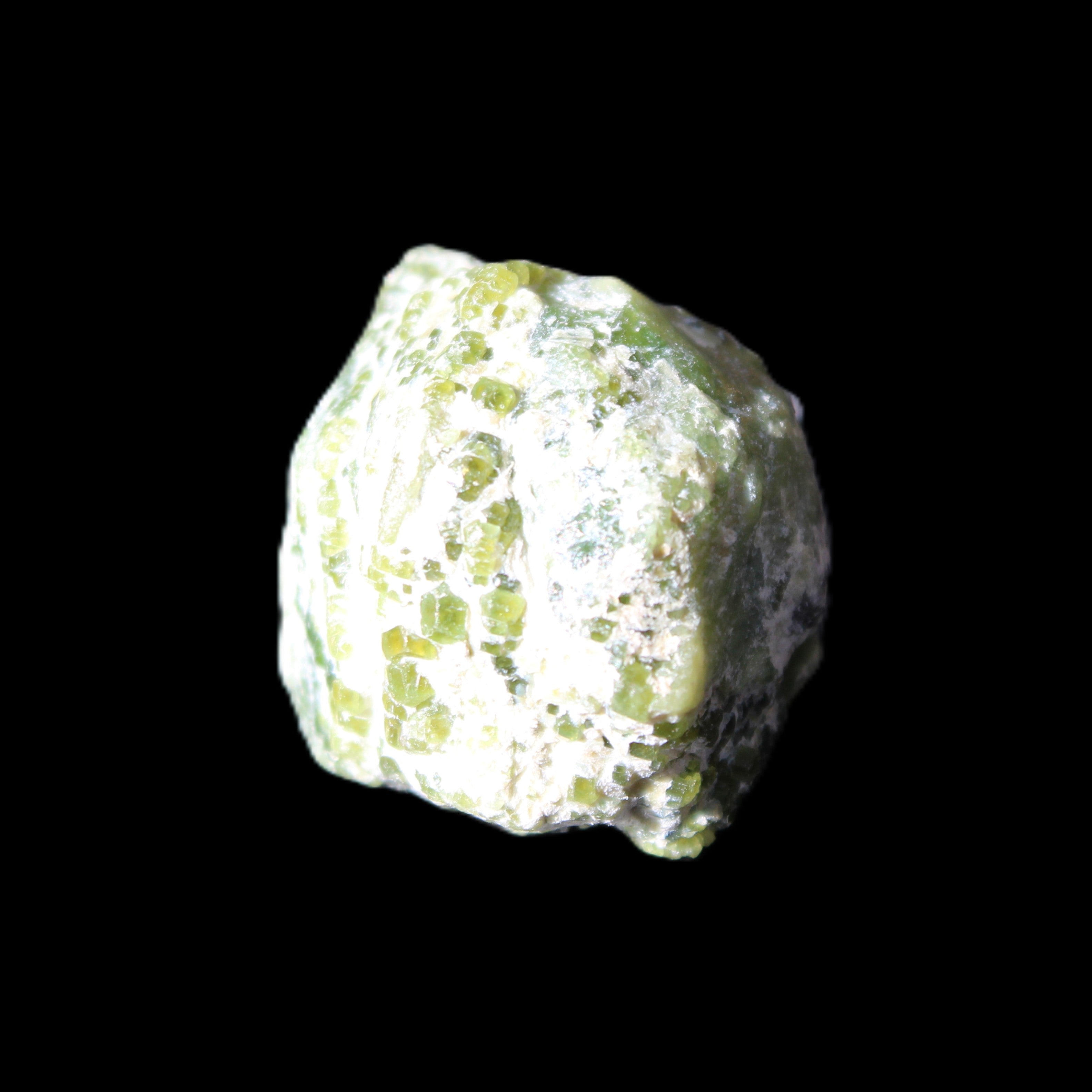 Green Garnet from Pakistan 25*21mm crystal 21g in sunlight - Rocks and Things Store