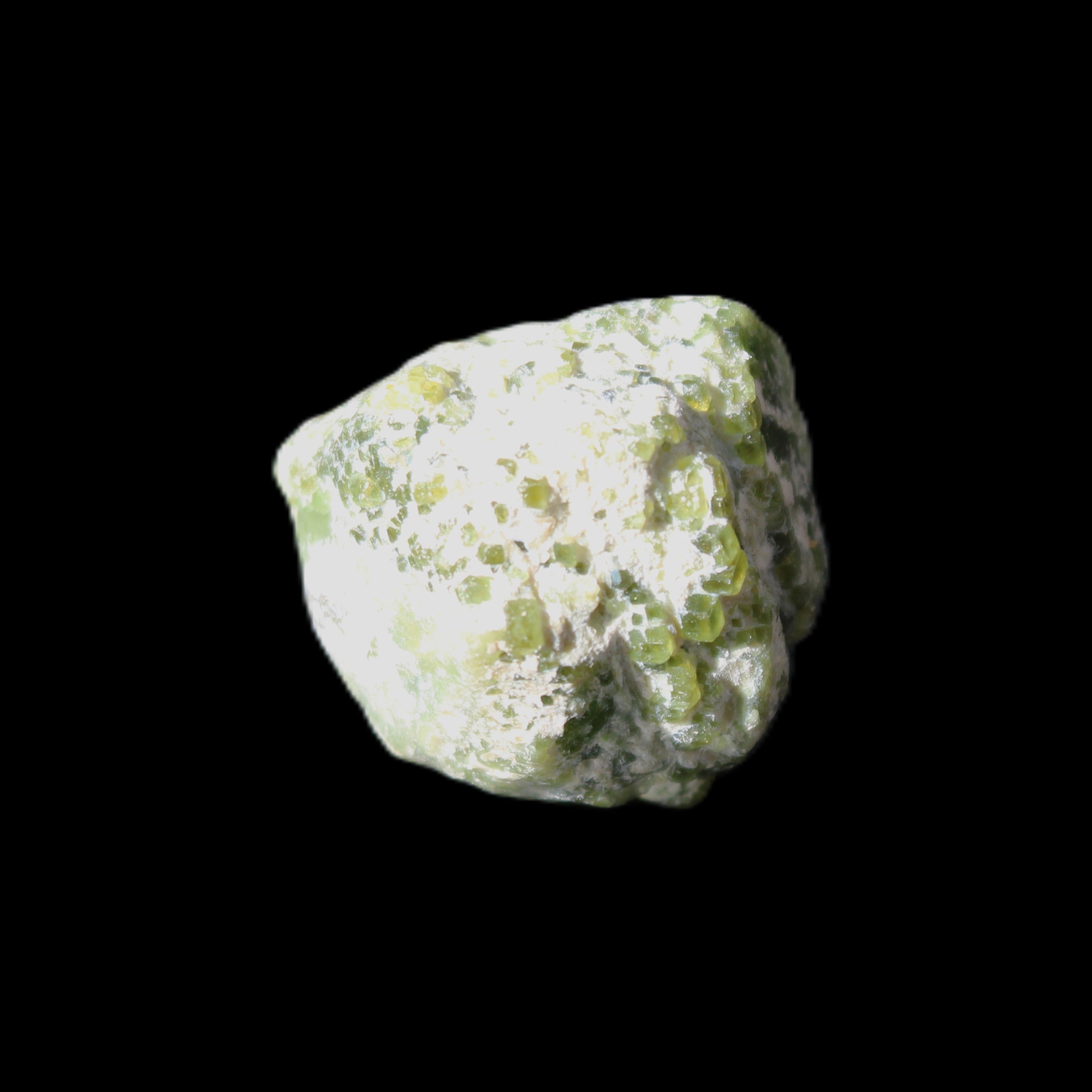 Green Garnet from Pakistan 25*21mm crystal 21g in sunlight - Rocks and Things Store