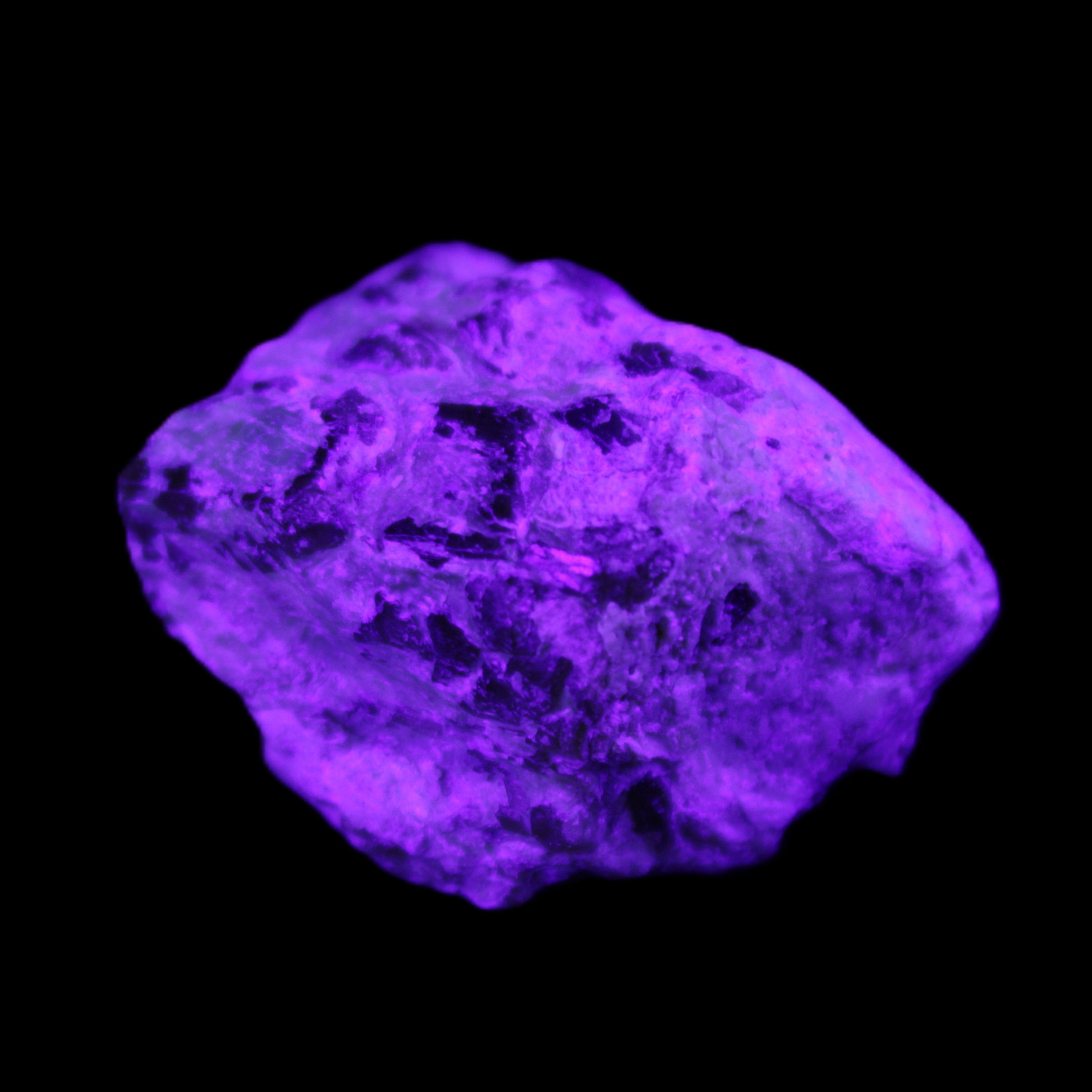 Green Garnet from Pakistan 30*22*16mm crystal 20g in UV light - Rocks and Things Store