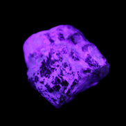 Green Garnet from Pakistan 30*22*16mm crystal 20g in UV light - Rocks and Things Store