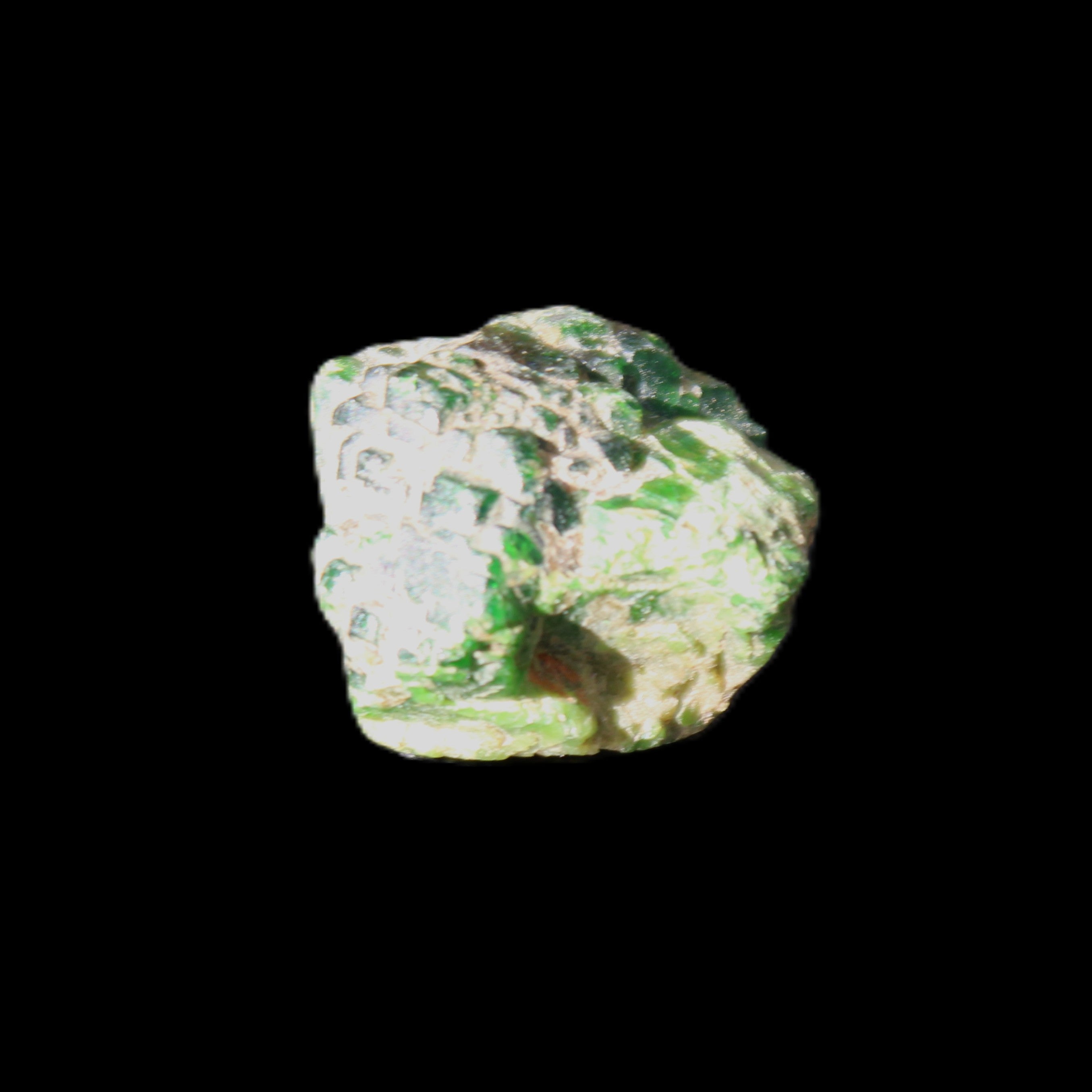 Green Garnet from Pakistan 19*21*14mm crystal 13.3g in sunlight - Rocks and Things Store