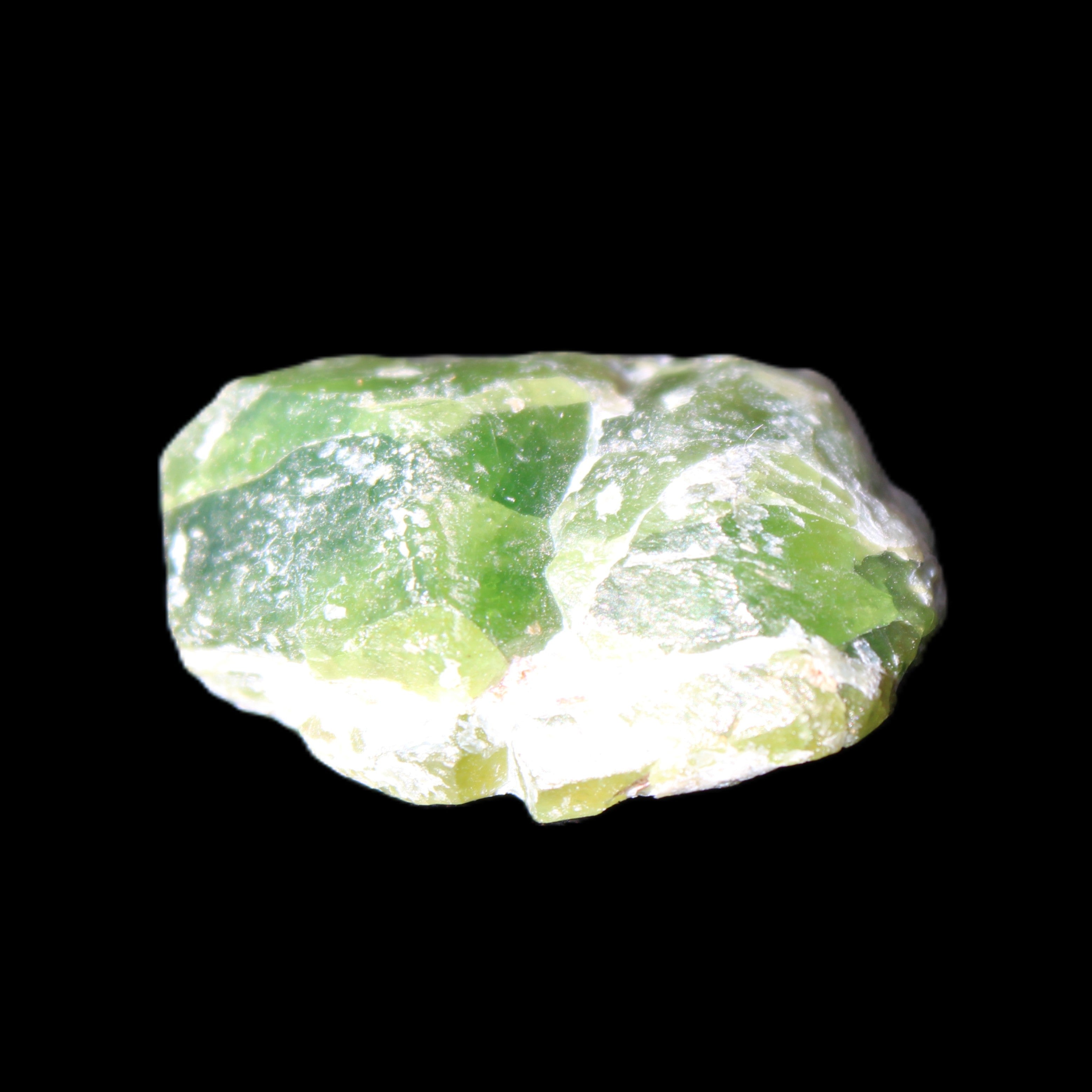 Green Garnet from Pakistan 25*19*9mm crystal 10.0g in sunlight - Rocks and Things Store