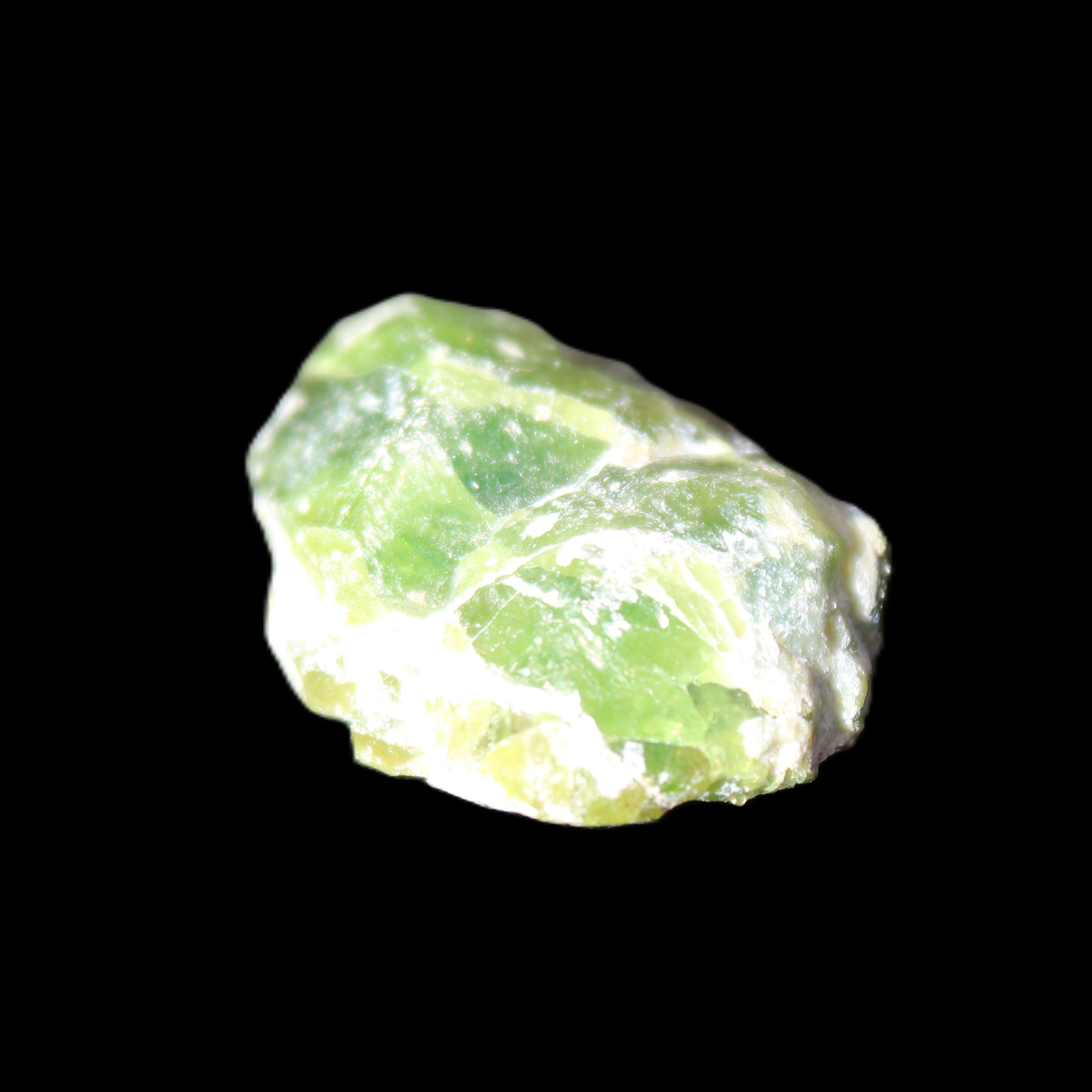 Green Garnet from Pakistan 25*19*9mm crystal 10.0g in sunlight - Rocks and Things Store