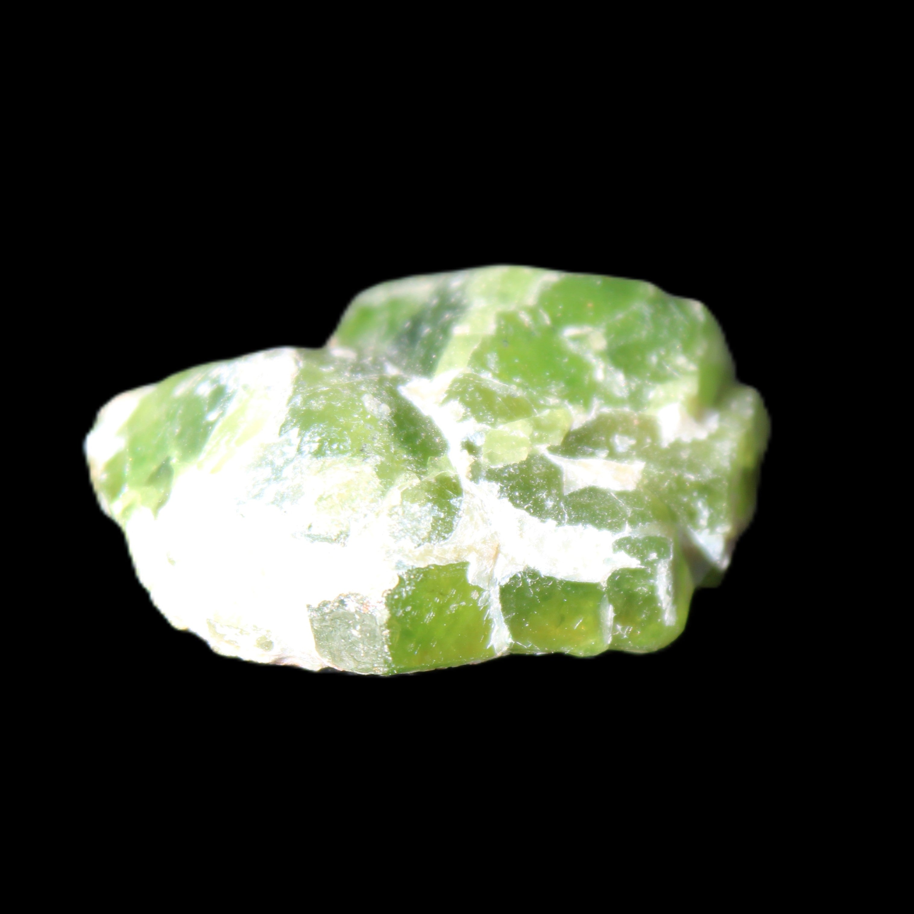 Green Garnet from Pakistan 25*19*9mm crystal 10.0g in sunlight - Rocks and Things Store
