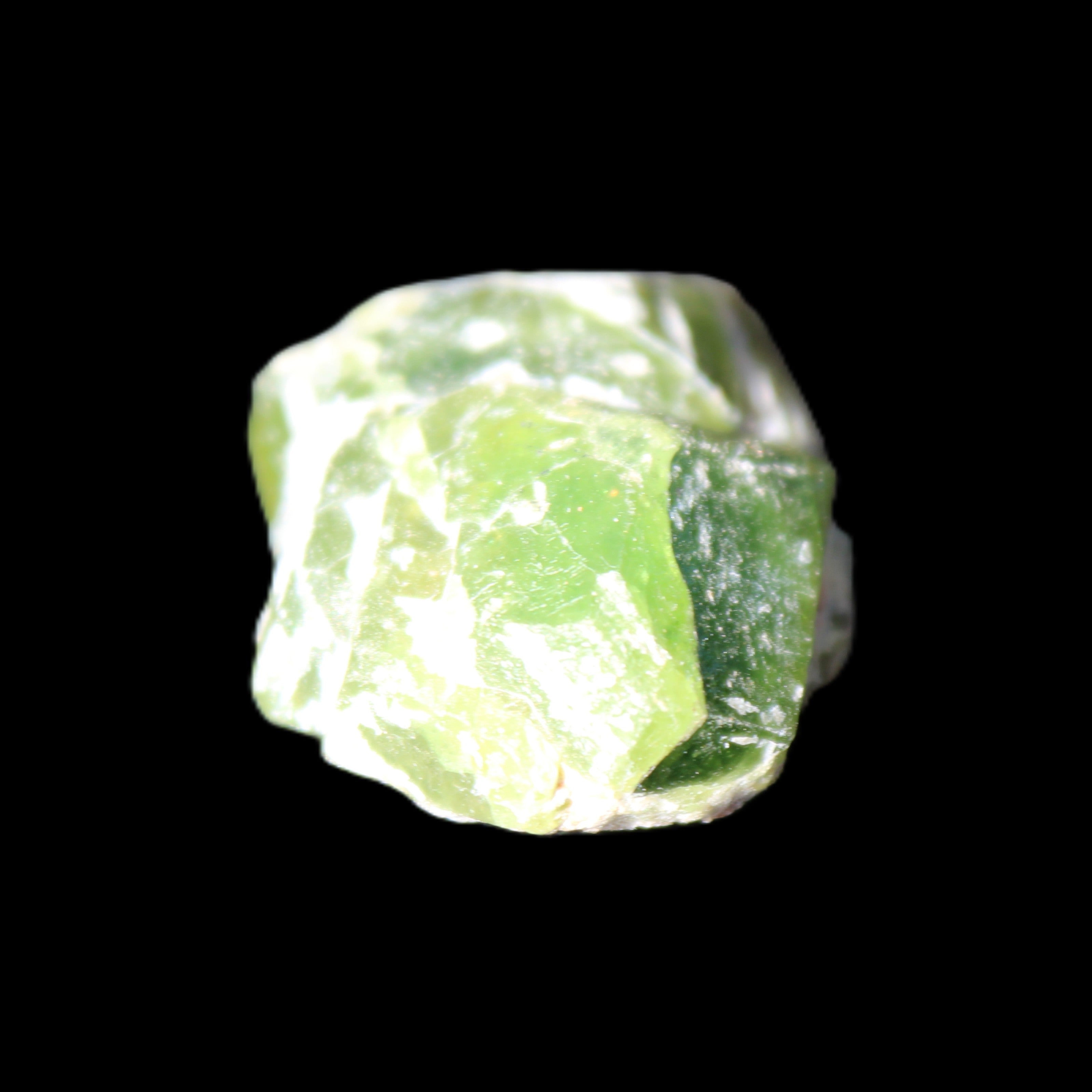 Green Garnet from Pakistan 25*19*9mm crystal 10.0g in sunlight - Rocks and Things Store