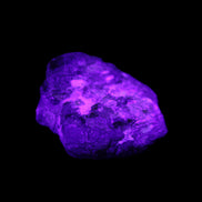 Green Garnet from Pakistan crystal 26*10mm 15.2g in UV light - Rocks and Things Store