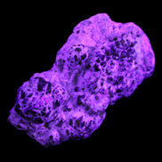 Green Garnet from Pakistan crystal cluster 67*35*25mm 89g in UV light - Rocks and Things Store