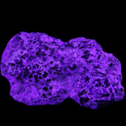 Green Garnet from Pakistan crystal cluster 67*35*25mm 89g in UV light - Rocks and Things Store
