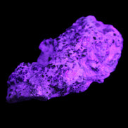 Green Garnet from Pakistan crystal cluster 67*35*25mm 89g in UV light - Rocks and Things Store