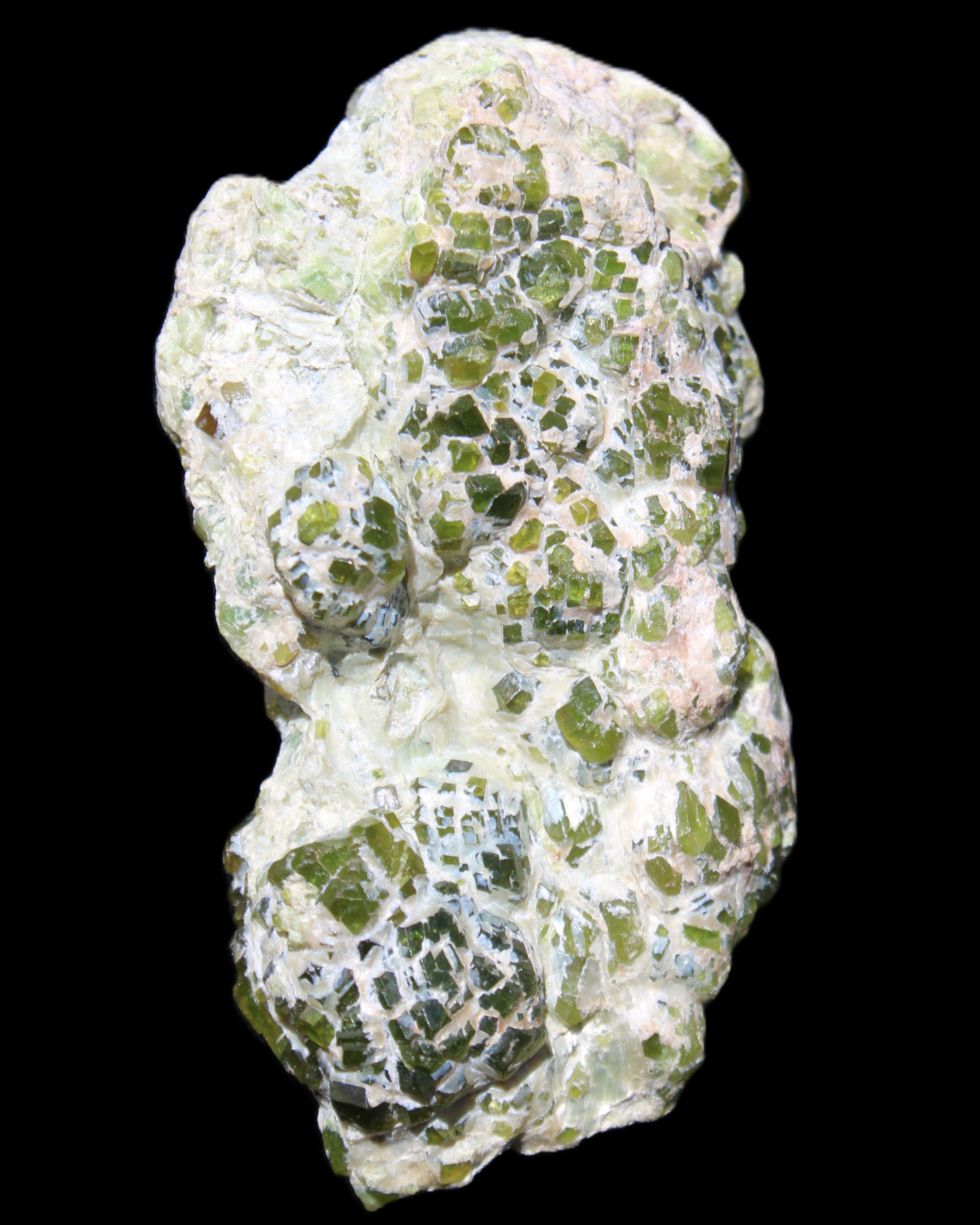 Green Garnet from Pakistan crystal cluster 67*35*25mm 89g in sunlight - Rocks and Things Store