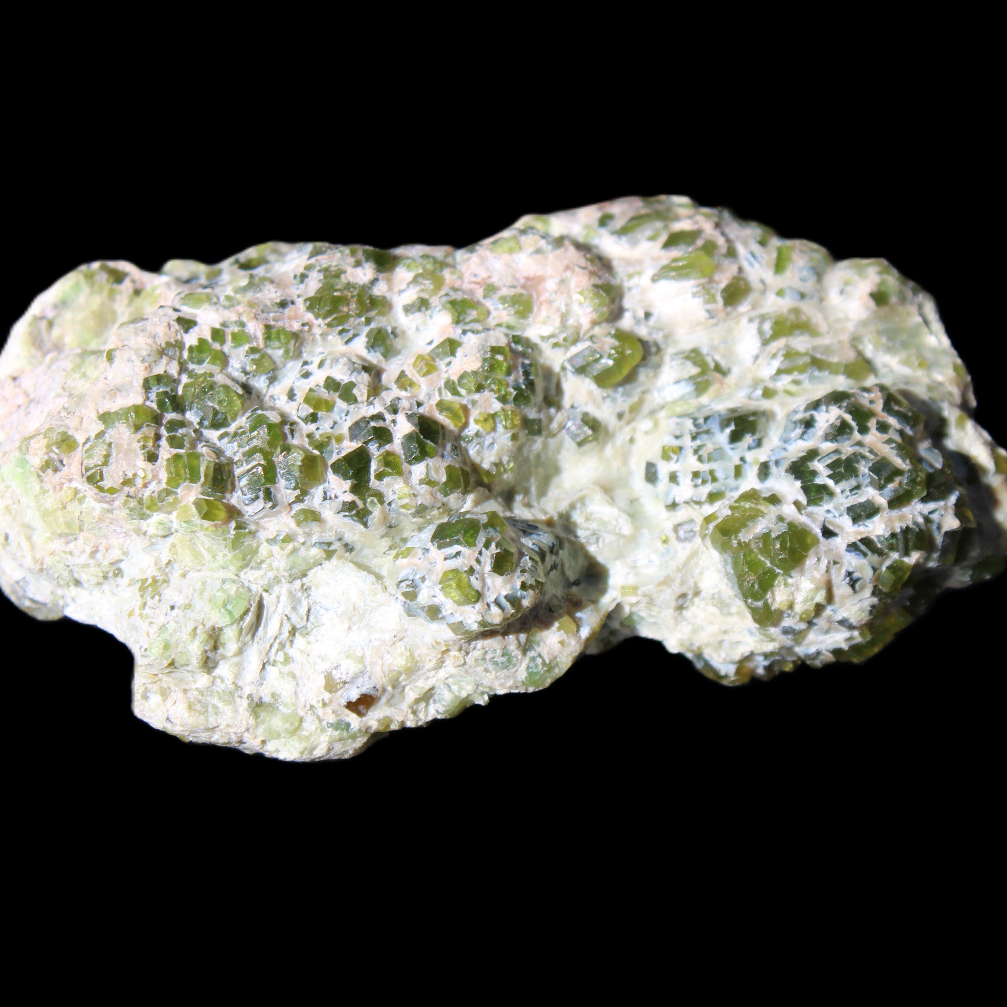 Green Garnet from Pakistan crystal cluster 67*35*25mm 89g in sunlight - Rocks and Things Store