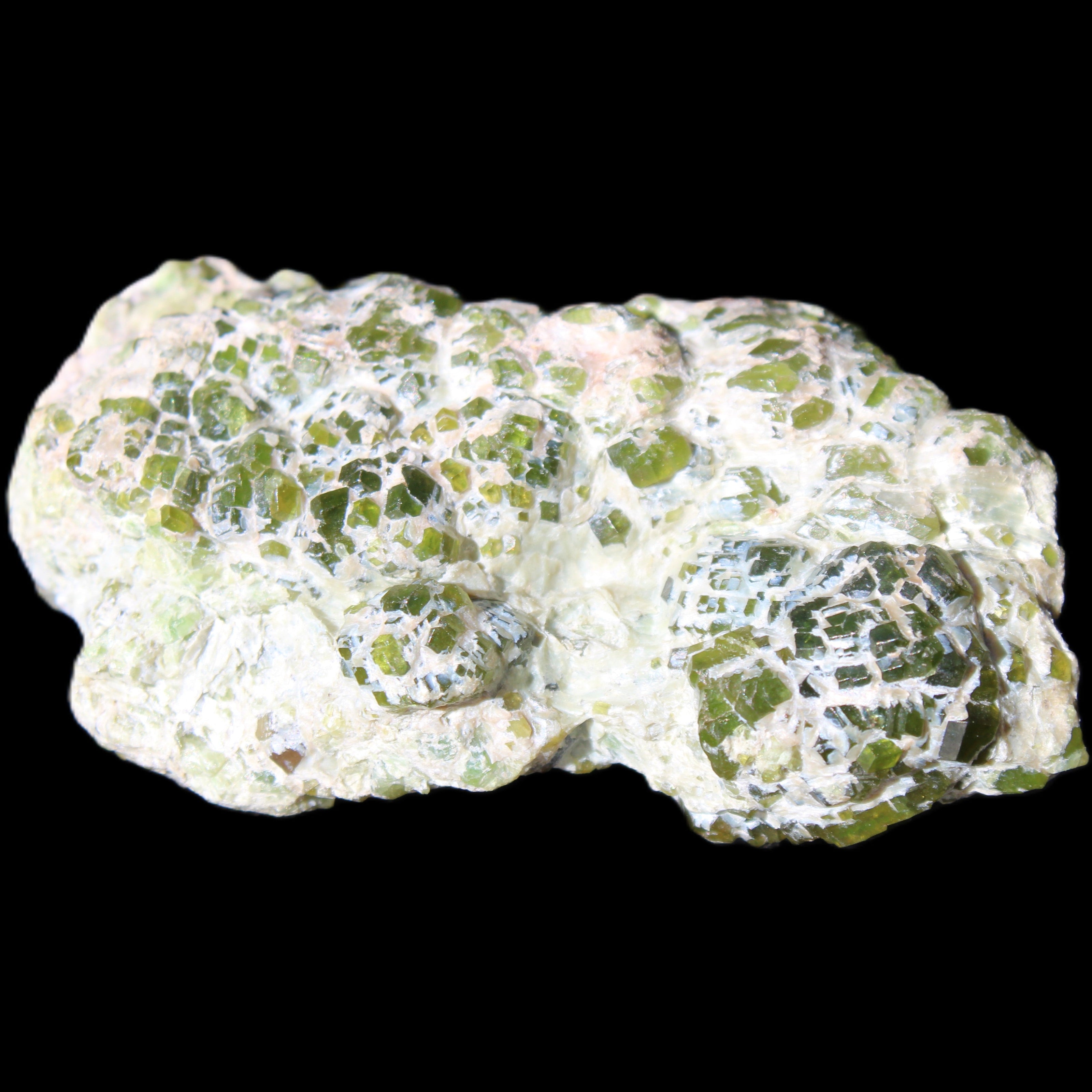 Green Garnet from Pakistan crystal cluster 67*35*25mm 89g in sunlight - Rocks and Things Store