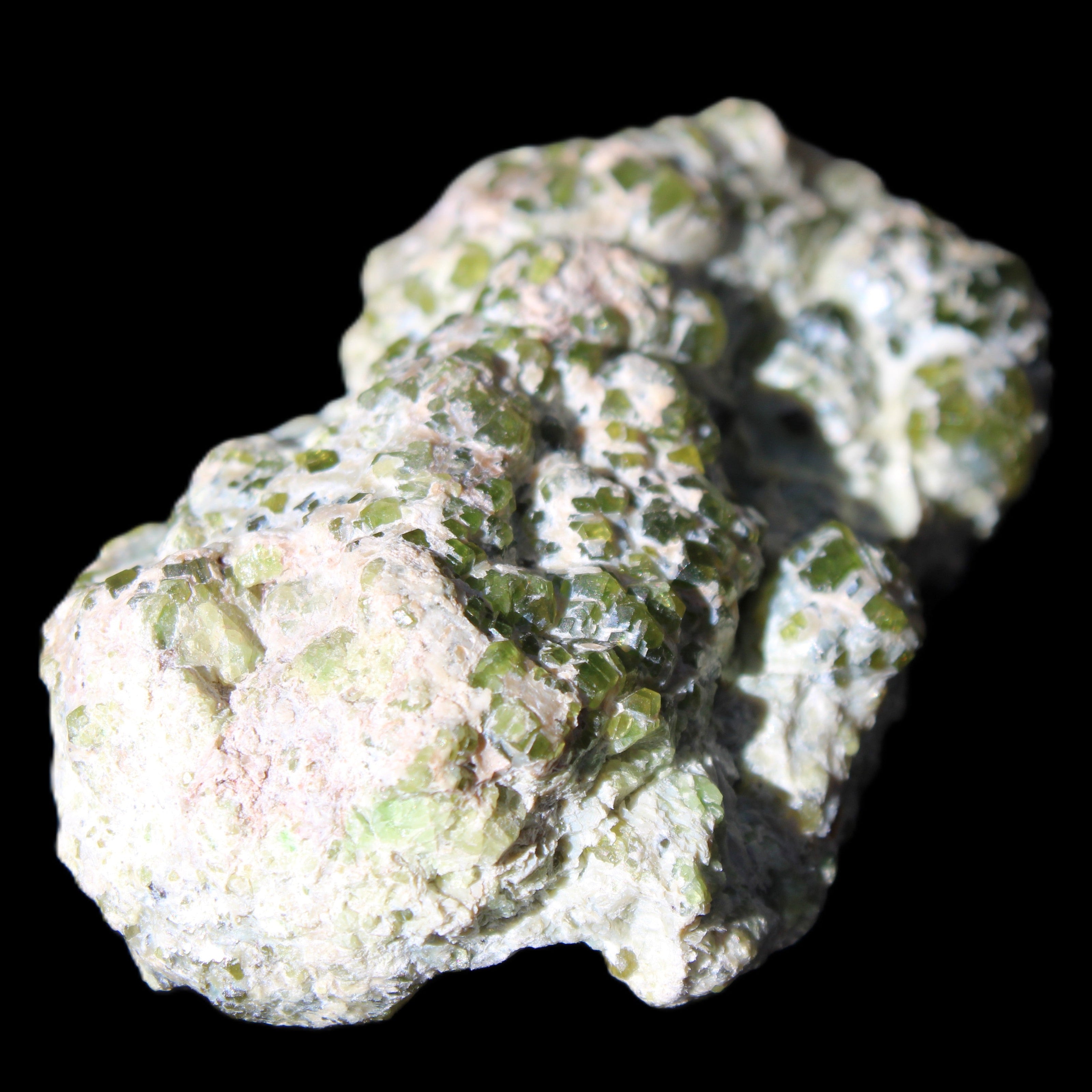 Green Garnet from Pakistan crystal cluster 67*35*25mm 89g in sunlight - Rocks and Things Store