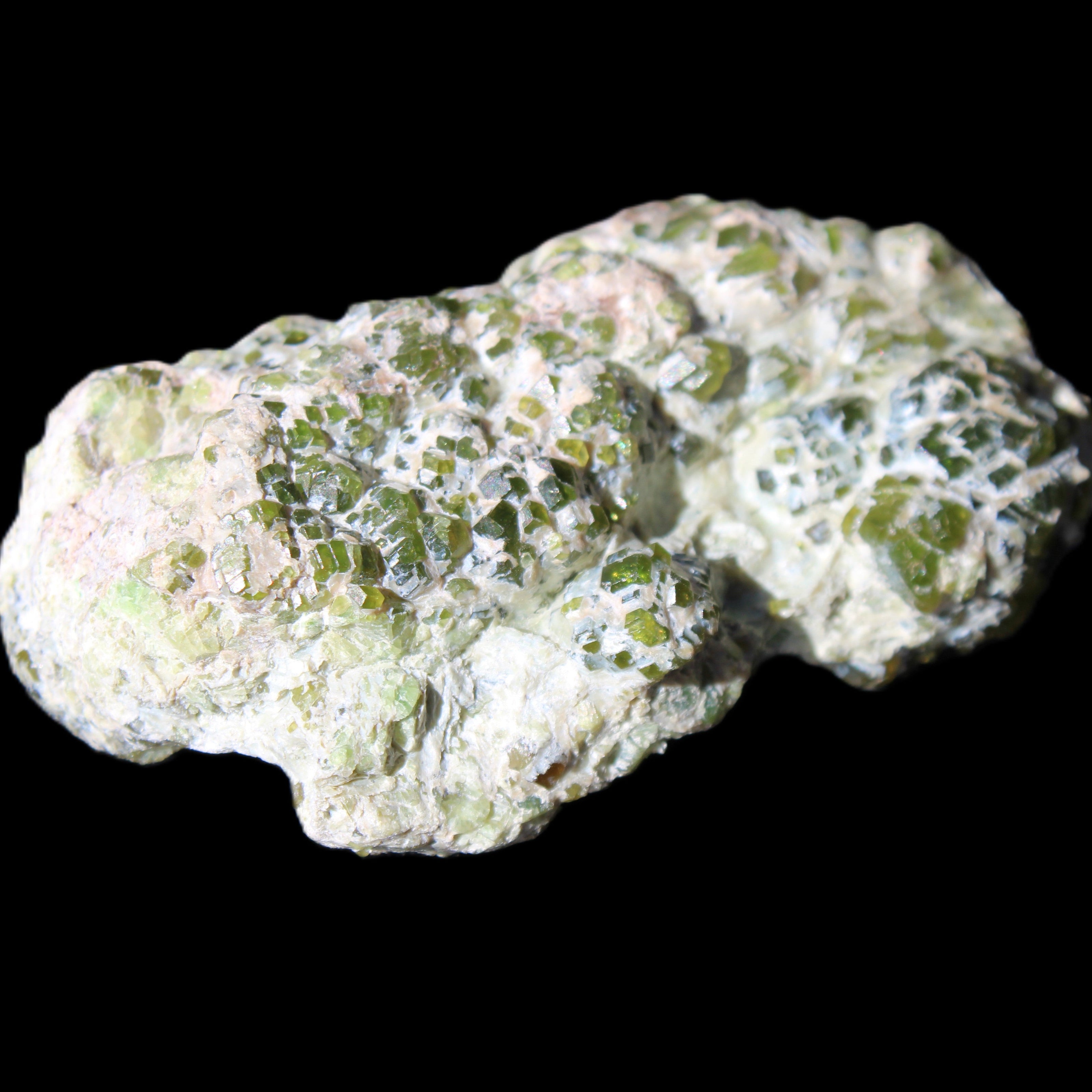 Green Garnet from Pakistan crystal cluster 67*35*25mm 89g in sunlight - Rocks and Things Store